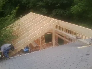 Framing a new roof addition that ties into an existing shingle roof in Jamestown